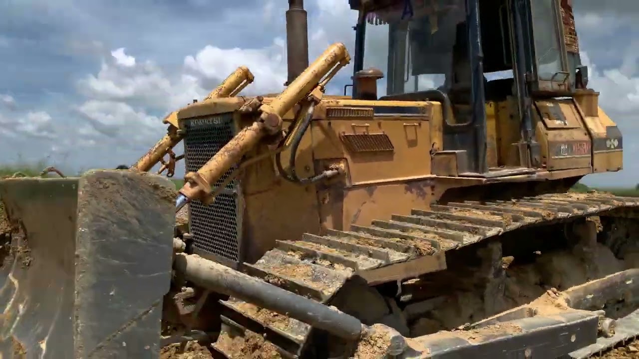 How Do Earthmoving Trucks Transform Lake Construction