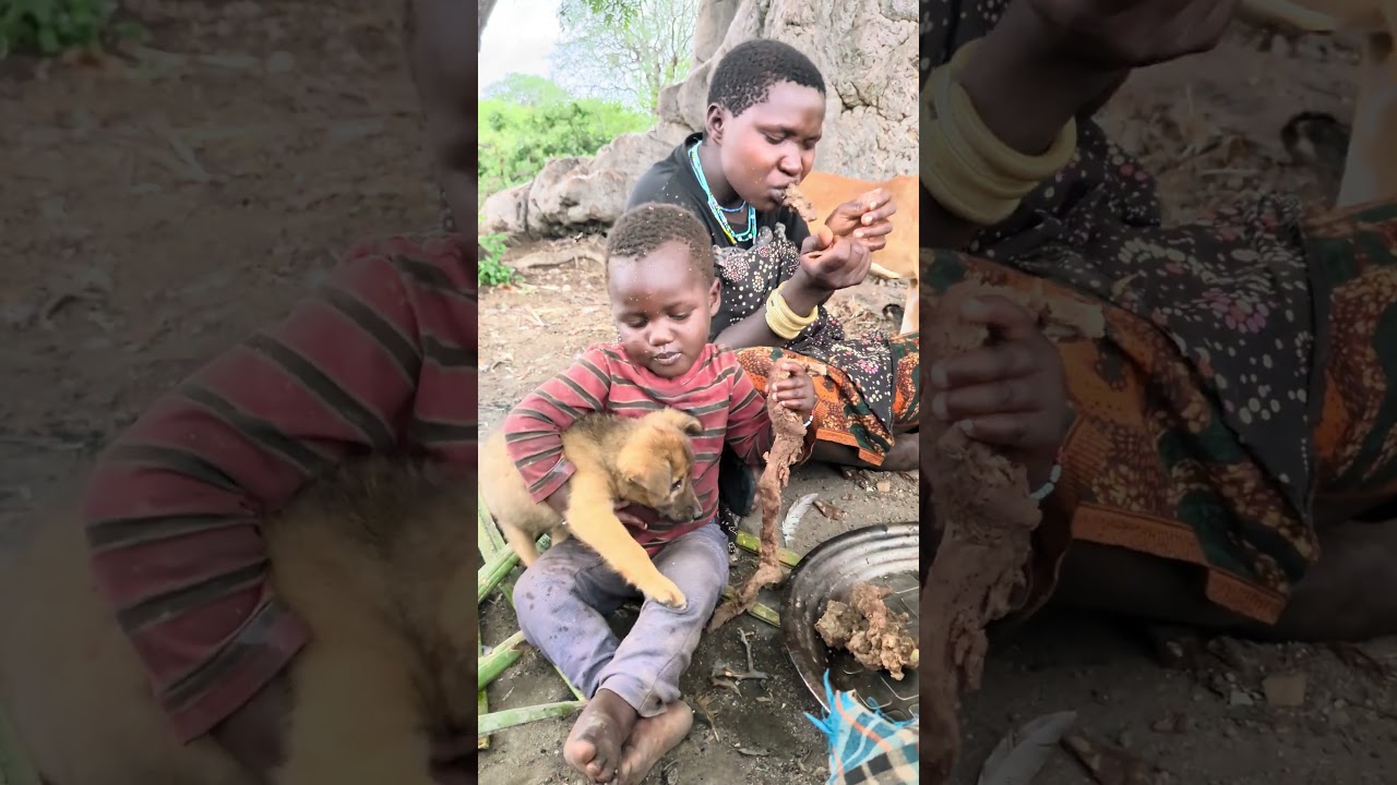 Traditional Hadzabe tribe cooking wild meat in Tanzania.Village food and African culture lifestyle.