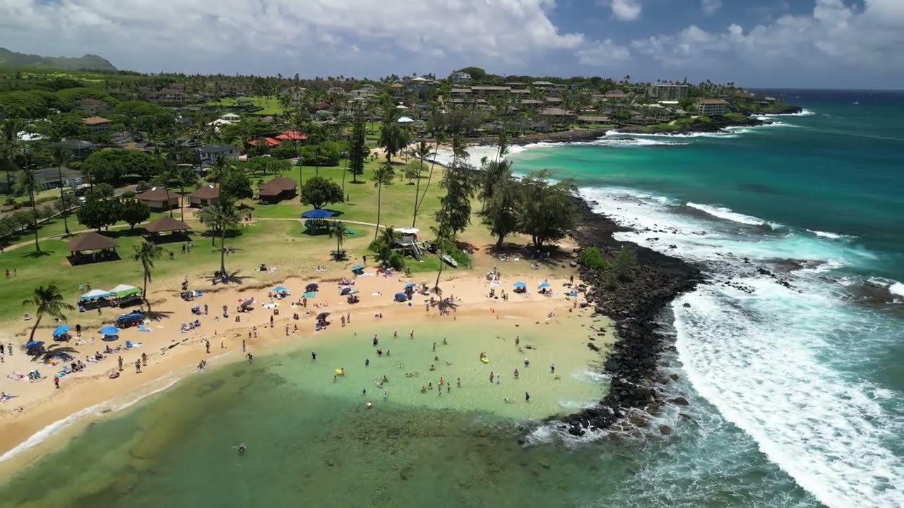 Poipu Beach, Kauai, Hawaii - drone flyover