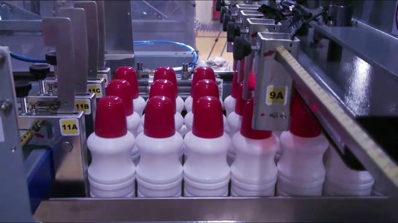 Encajadora EVG | Botellas cilíndricas de base estrecha