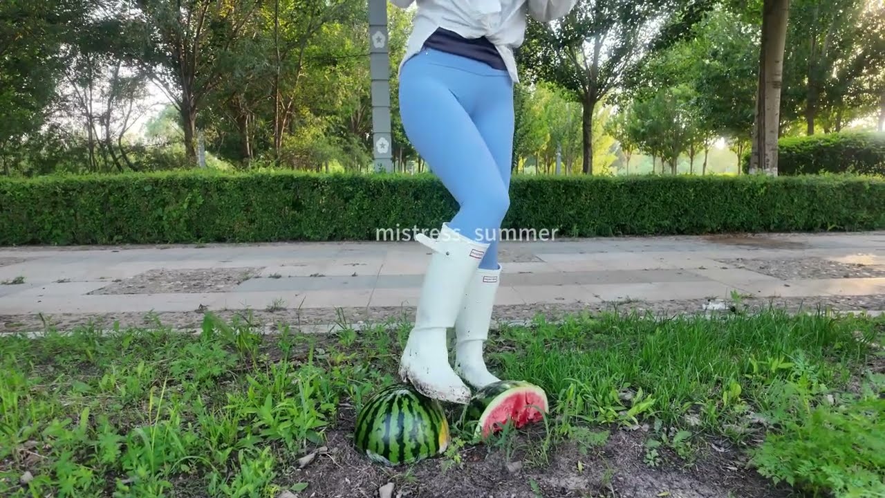 Crushing watermelon outdoors(two different perspectives)