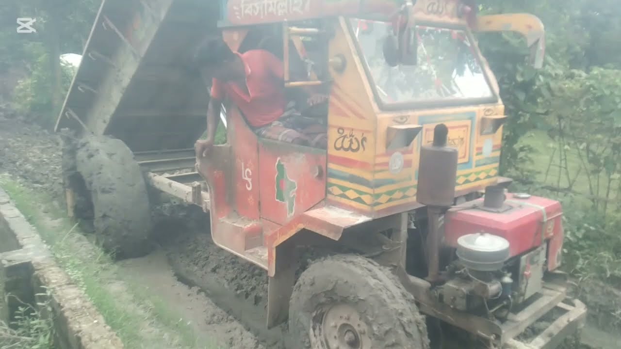 রাস্তার বেহাল দশা। যেভাবে কাদার রাস্তায় গাড়ি চলে। মানুষ কি চলাচল করা যায়।দাদা সেই স্বাদ। রাস্তা।