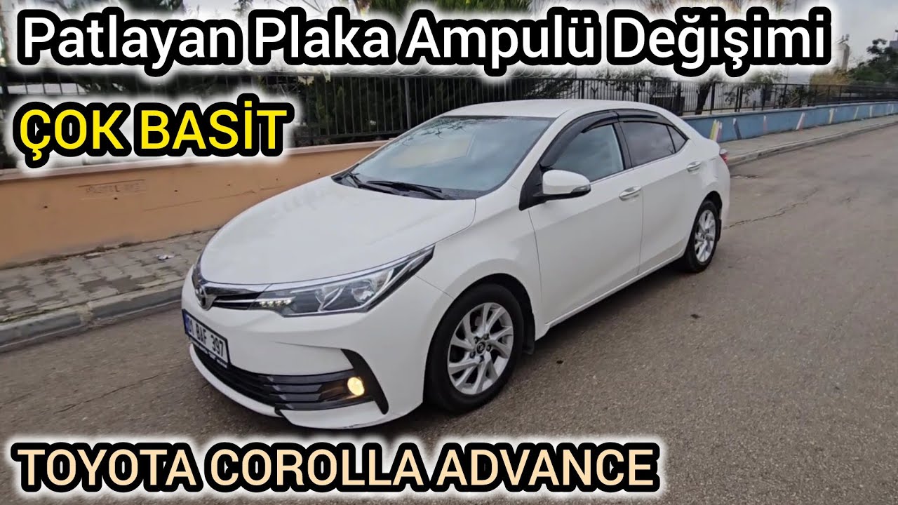 Замена лампочки подсветки номерного знака / Toyota Corolla / Advance / Подсветка номерного знака