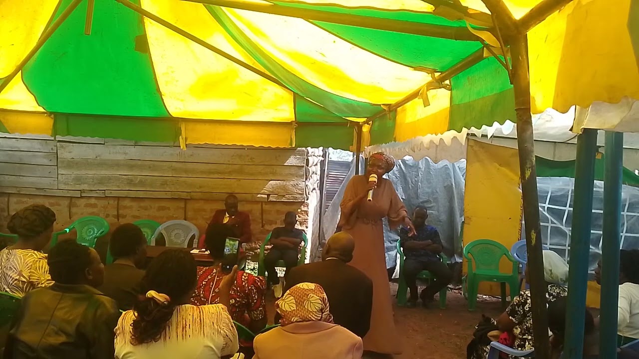 Bishop Hellen of Sonrise preaching at Wycliffe Juma during son's Chandoni day