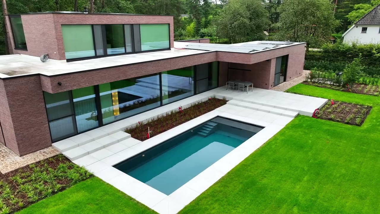 Exclusief buitenzwembad realisatie | Willy Naessens Swimming Pools