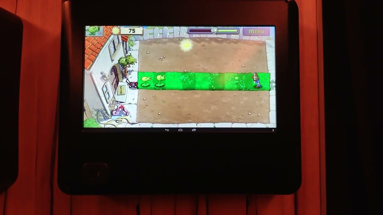 Plants vs Zombies on an airplane screen