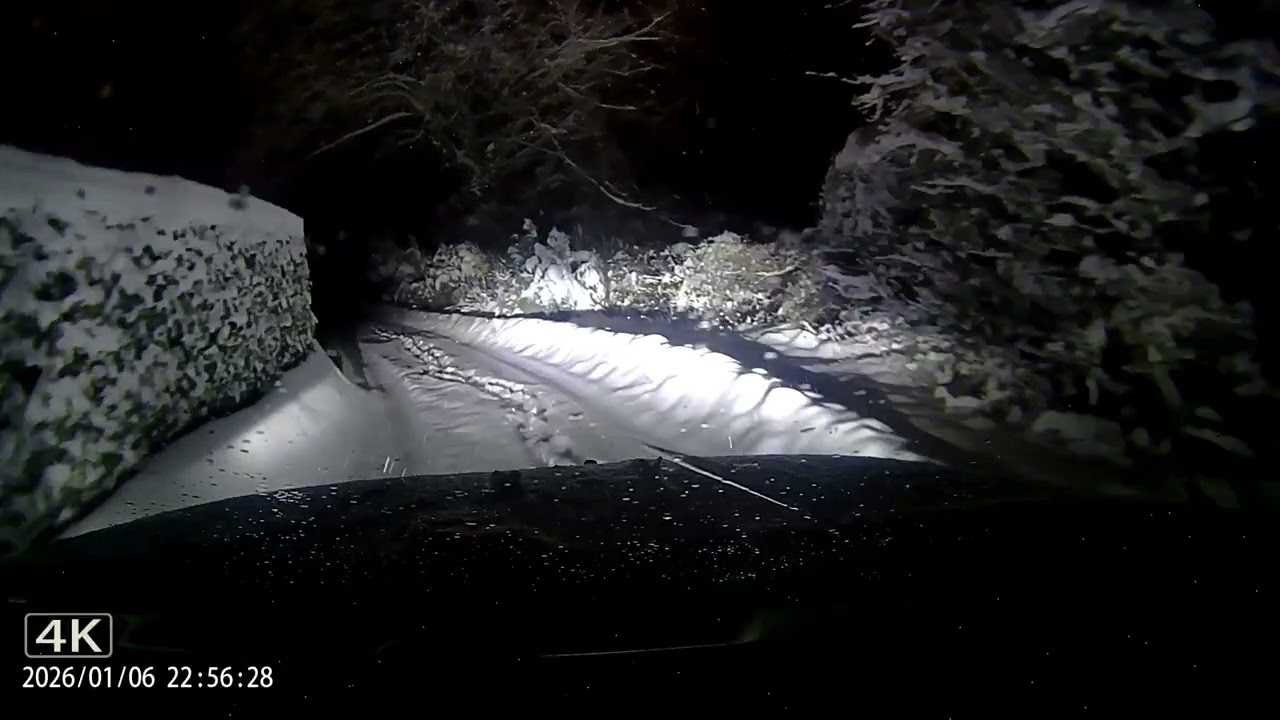 Hyundai Tucson 4WD NX4 MY25 driving in the snow on the hill