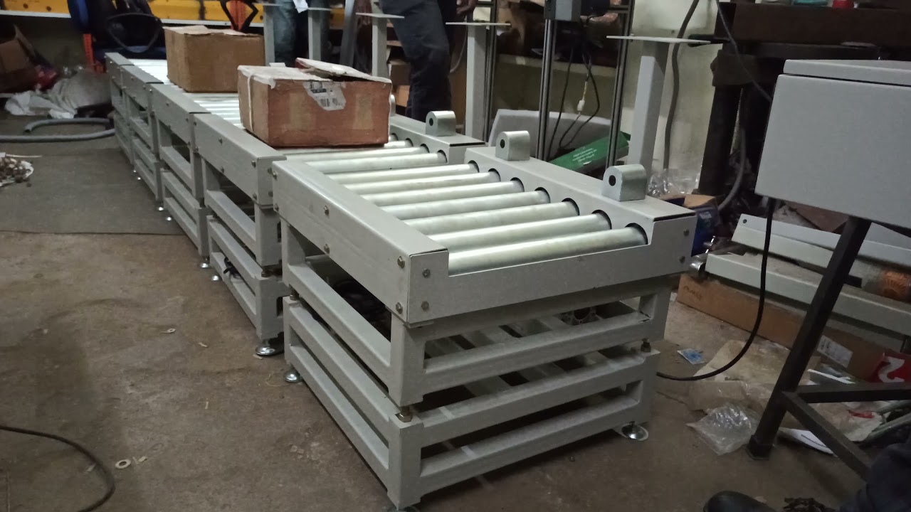 Static Check Weighing -  Power Roller Conveyor - Orange Conveyor Systems - 9940647200
