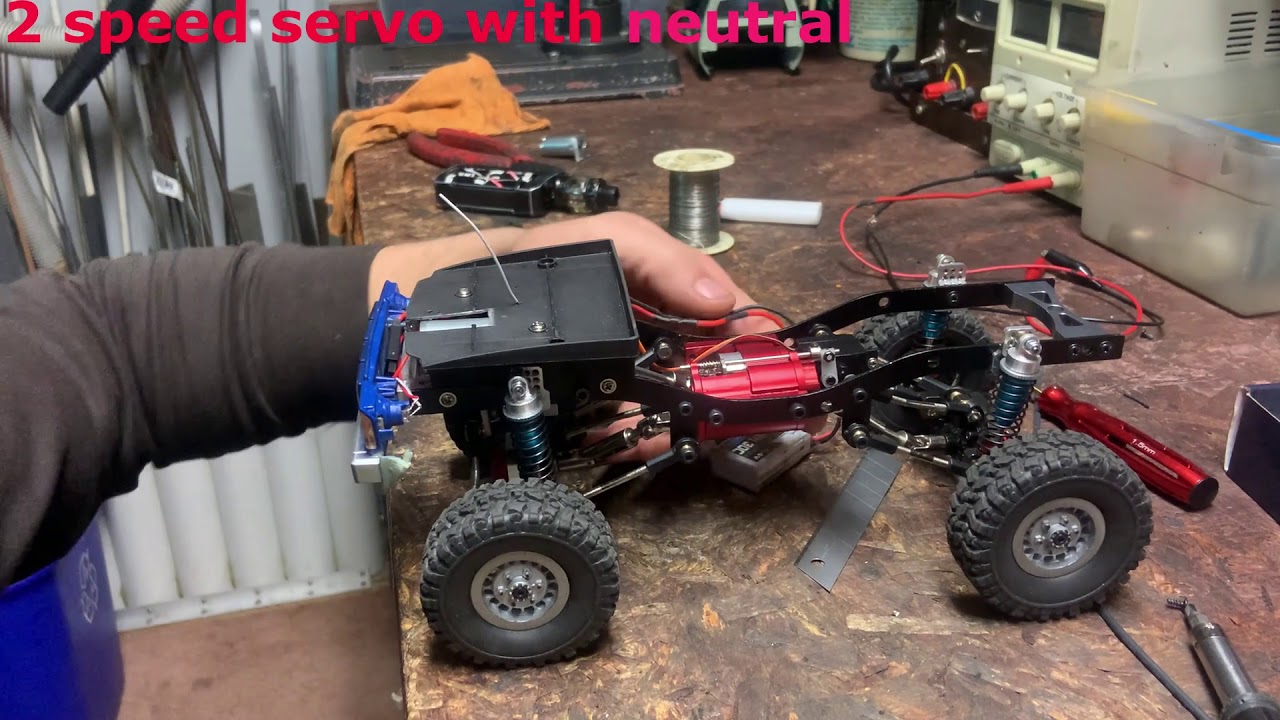 wpl c24 with 2 speed and motor relocated , and milled shock mounts