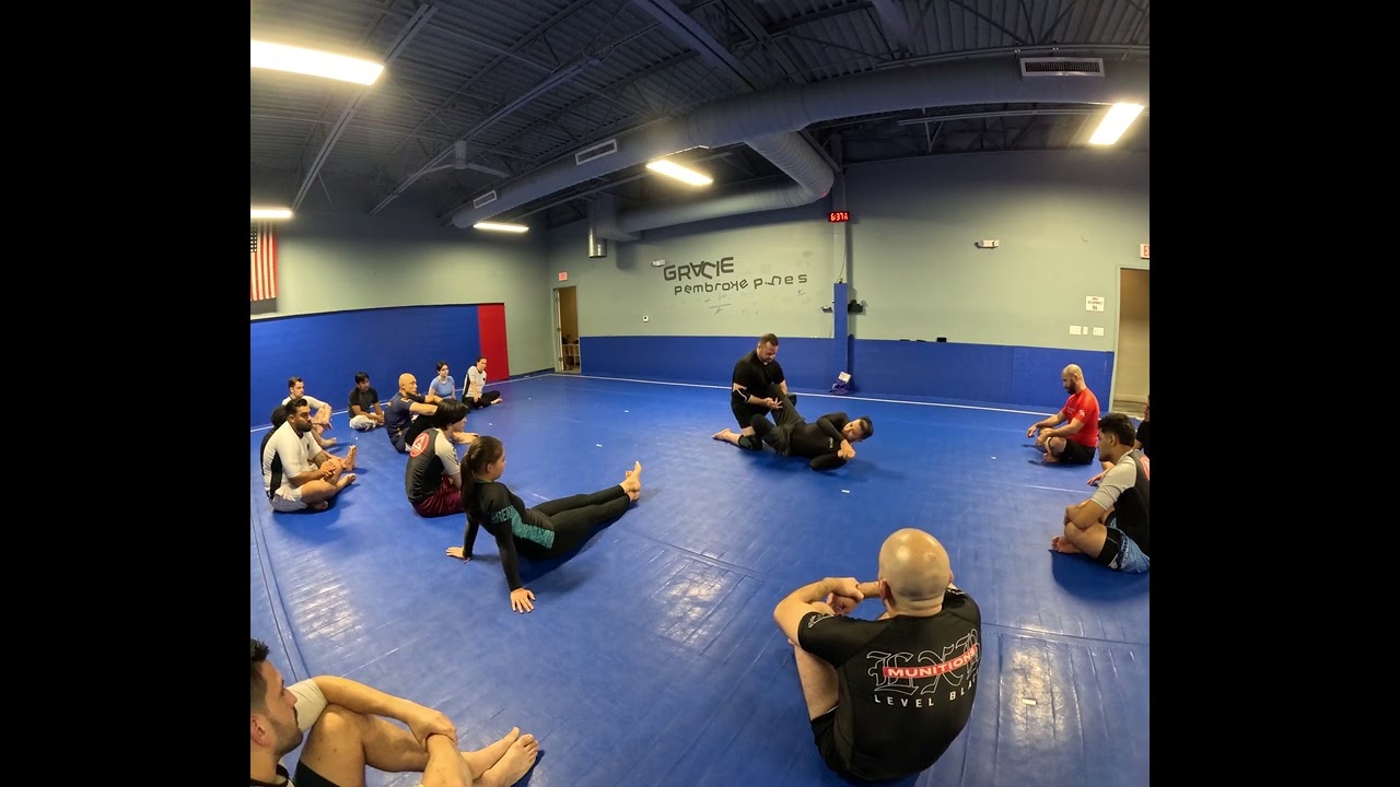 Shoulder crunch sweep from butterfly guard 
