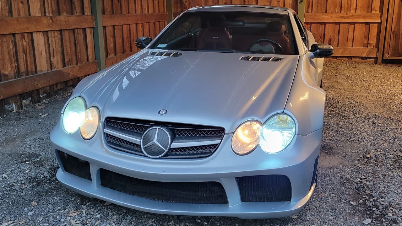 2003 SL55 AMG with Black Series wide body kit.