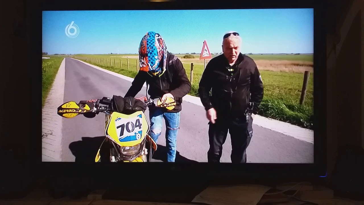 Motographic staande gehouden en beboet!