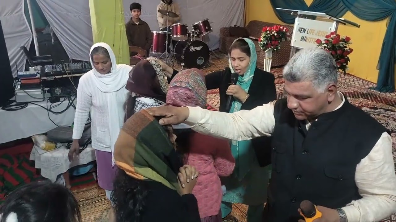 New Life Jesus Ministry Sunday meeting ley hand 