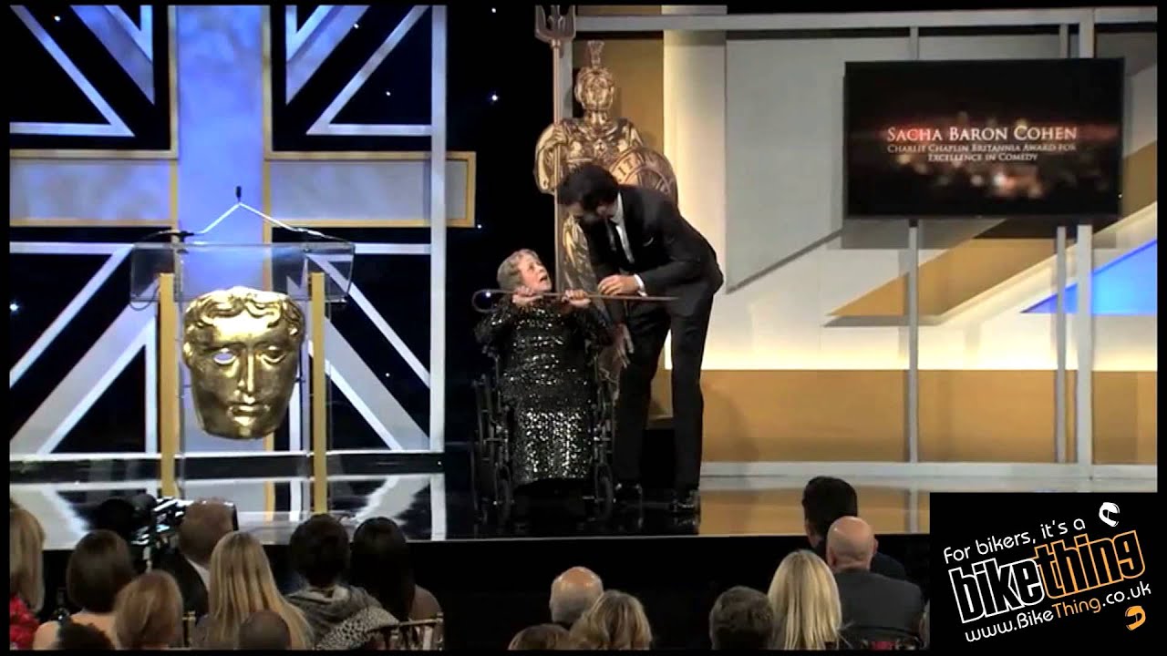 Sacha Baron Cohen - Charlie Chaplin Britannia Award - pushes woman in wheelchair off stage at awards