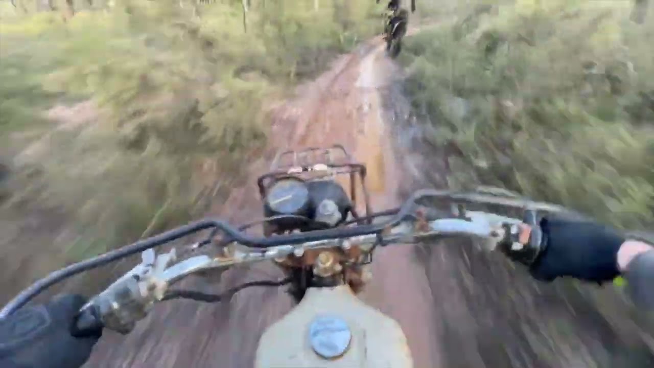wet trail ride on Vintage Yamaha