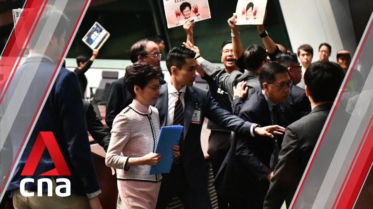 Carrie Lam aborts policy speech due to heckling from lawmakers