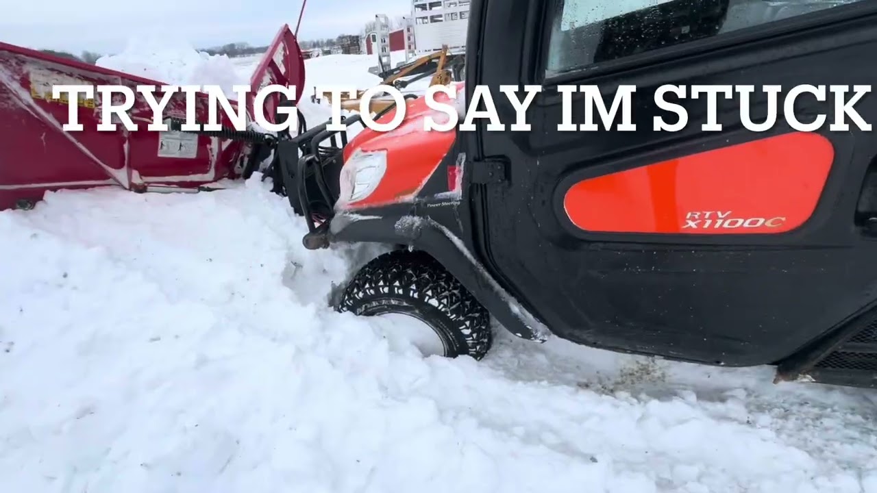 Pushing snow with Kubota rtv1100 and boss v plow