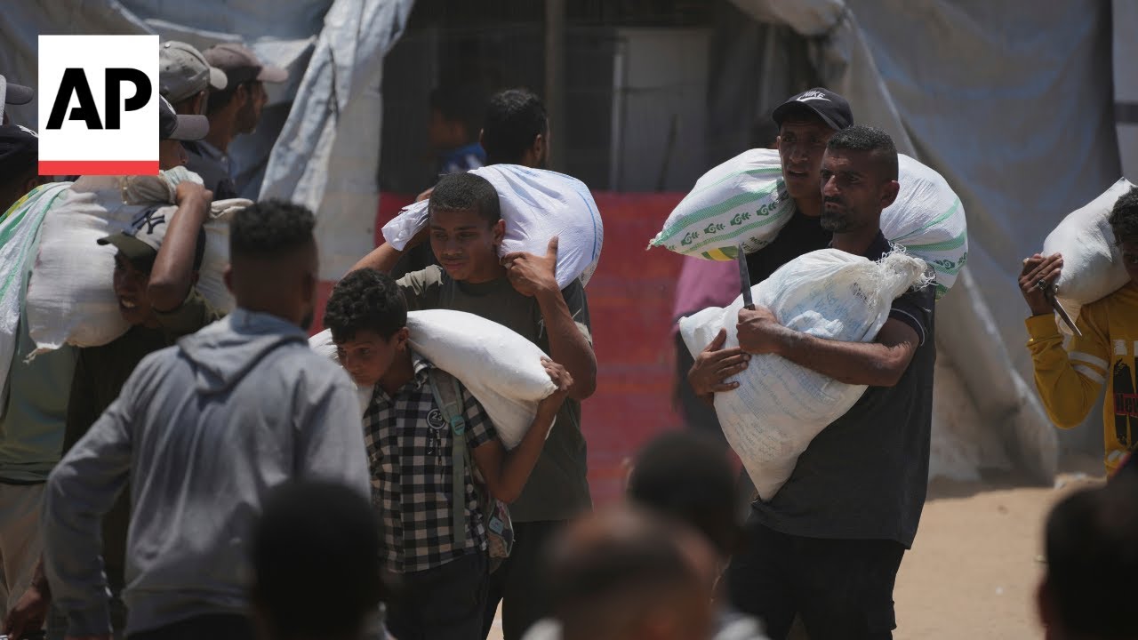 Palestinians say 12 killed near aid sites. Israel says it fired warning shots