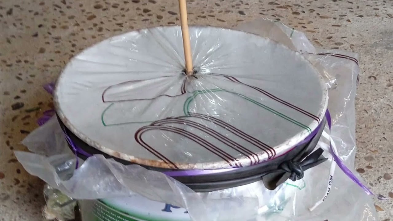 Zambomba casera Candi Flores