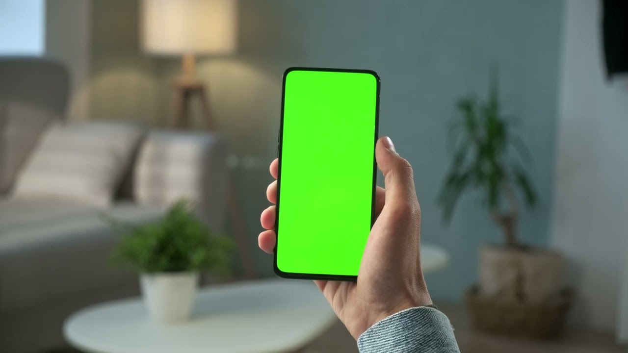 Mobile in hand green screen video