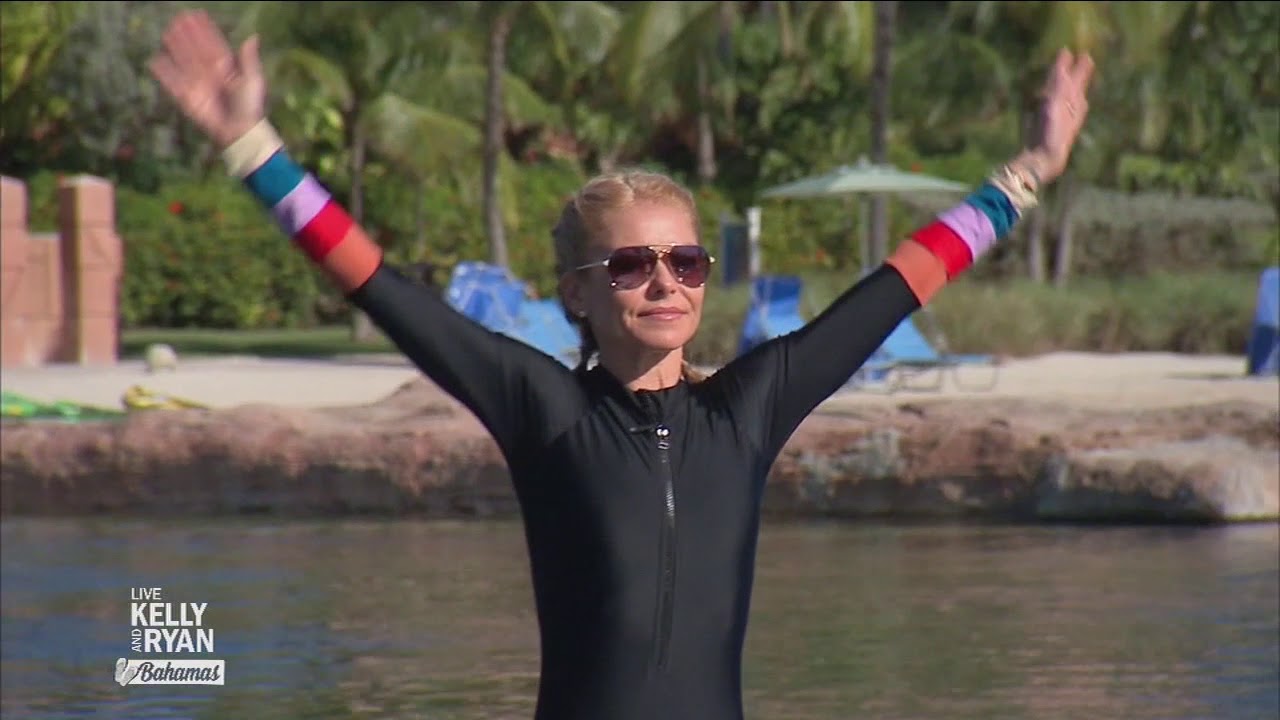 Kelly Does Yoga With Dolphins in the Bahamas