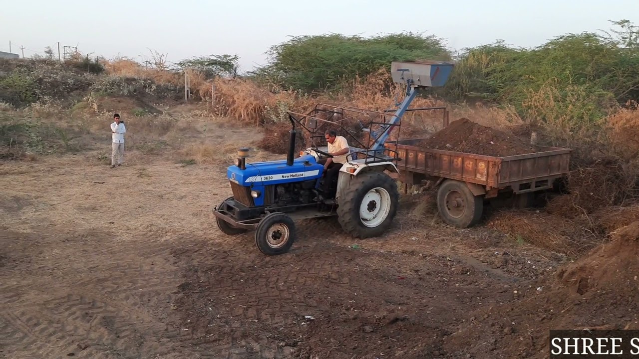 Tractor reverse loader