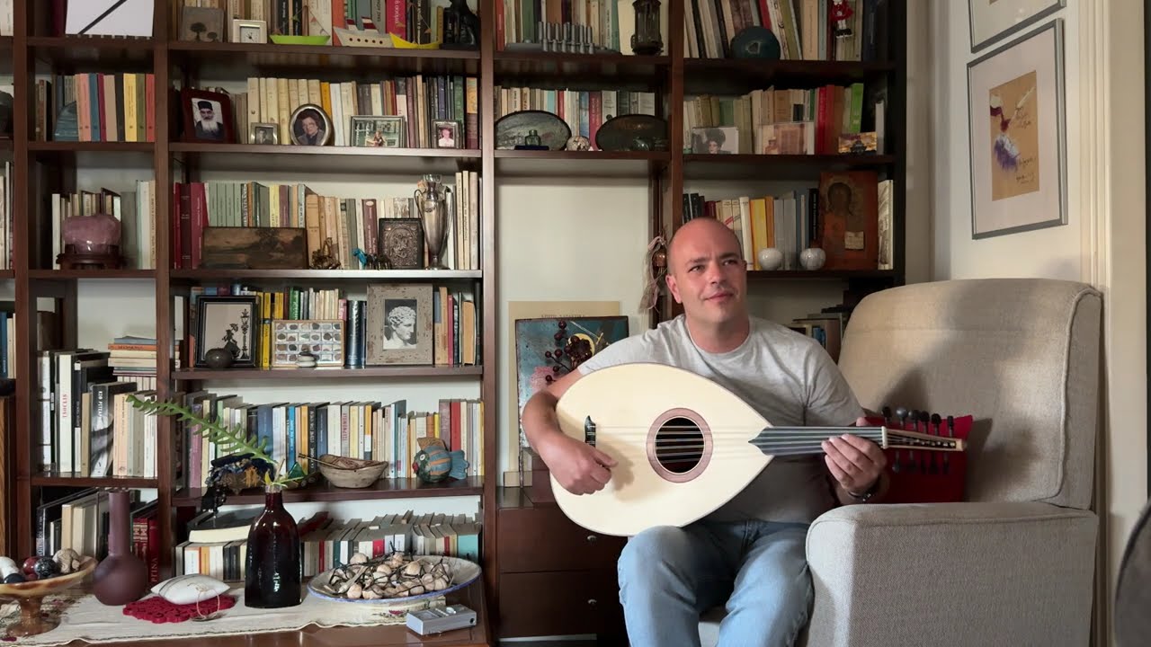 Arabic Oud made and played by Manolis. Padauk - Walnut bowl with Engelman Spruce Top.