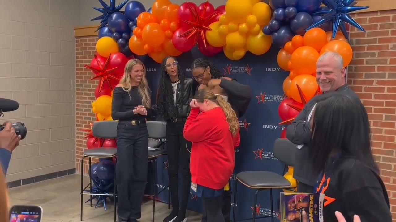 Indiana Fever players Lexie Hull, DeWanna Bonner, and Aliyah Boston meet fans at Indiana Pacers game
