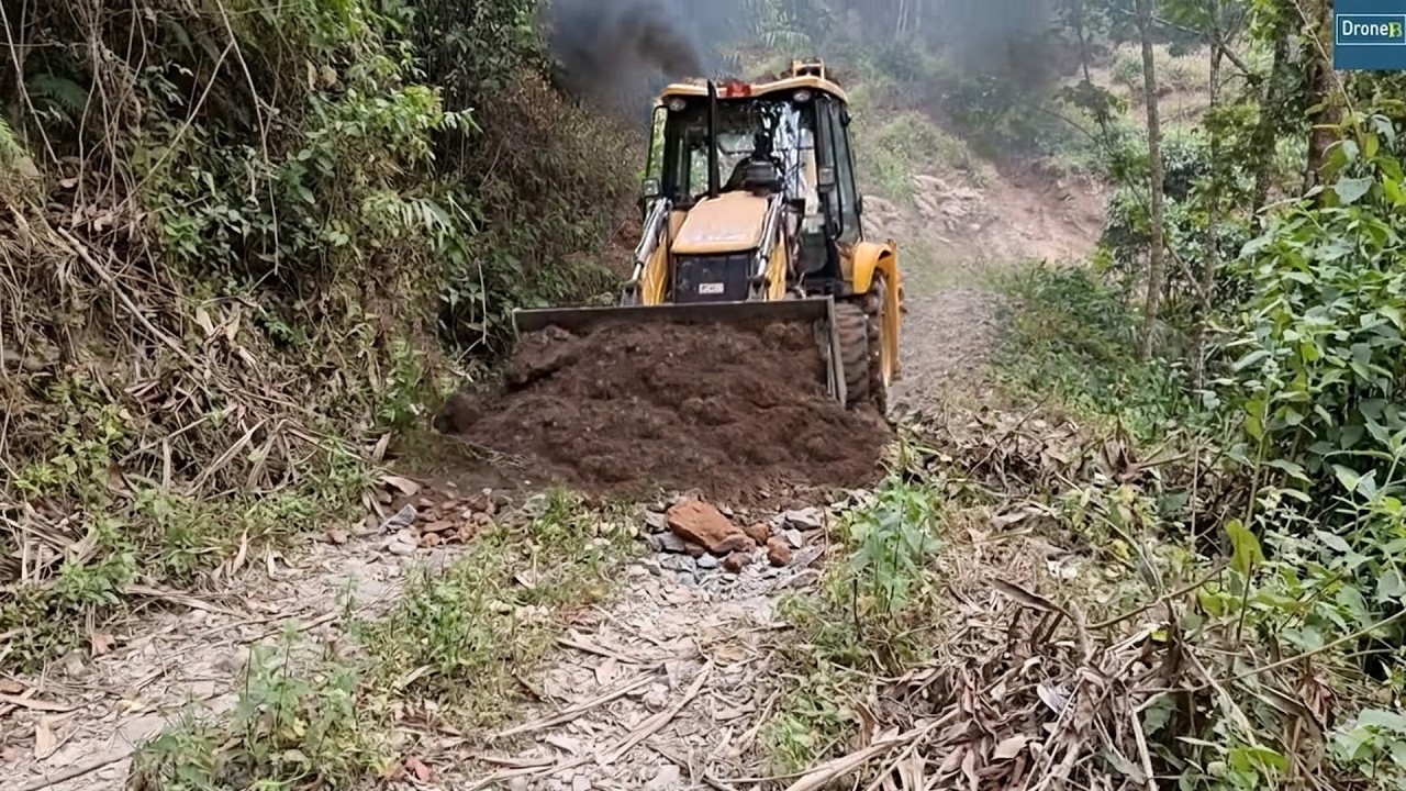 UNUSED Remote Mountain Road-Reopening Work with JCB