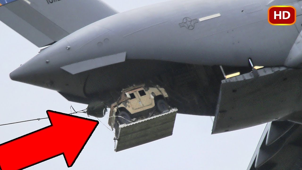 Monstrously Powerful C-130 Hercules Drop Humvees and Paratroopers