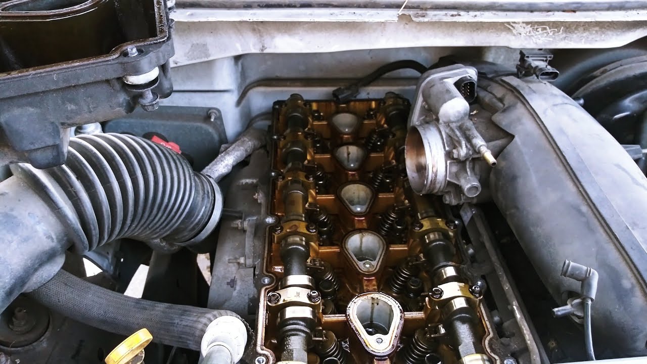 Como cambiar la tapa de punteria de una GMC 2004
