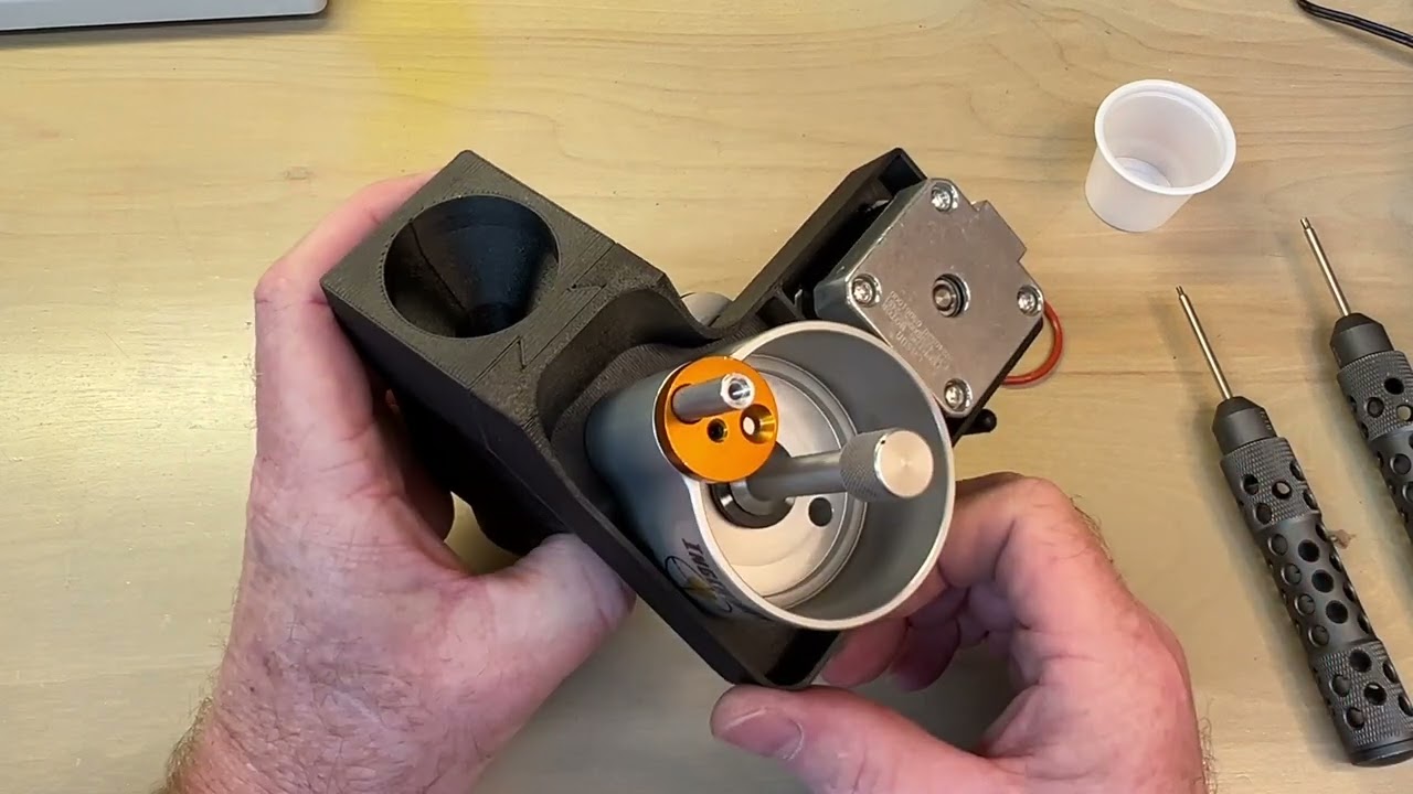 New powder meter/trickler assembly and mounting to scale