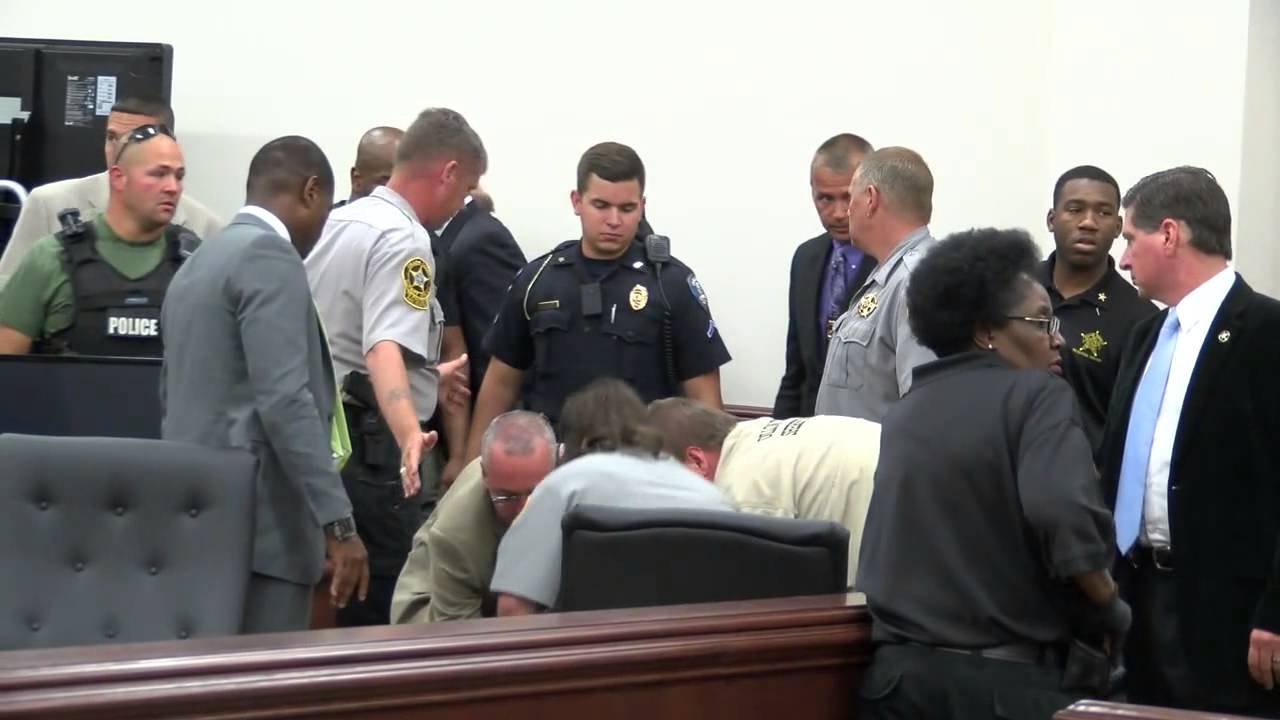 After guilty verdict in second murder trial, defendant attacks officer and spits on prosecutor