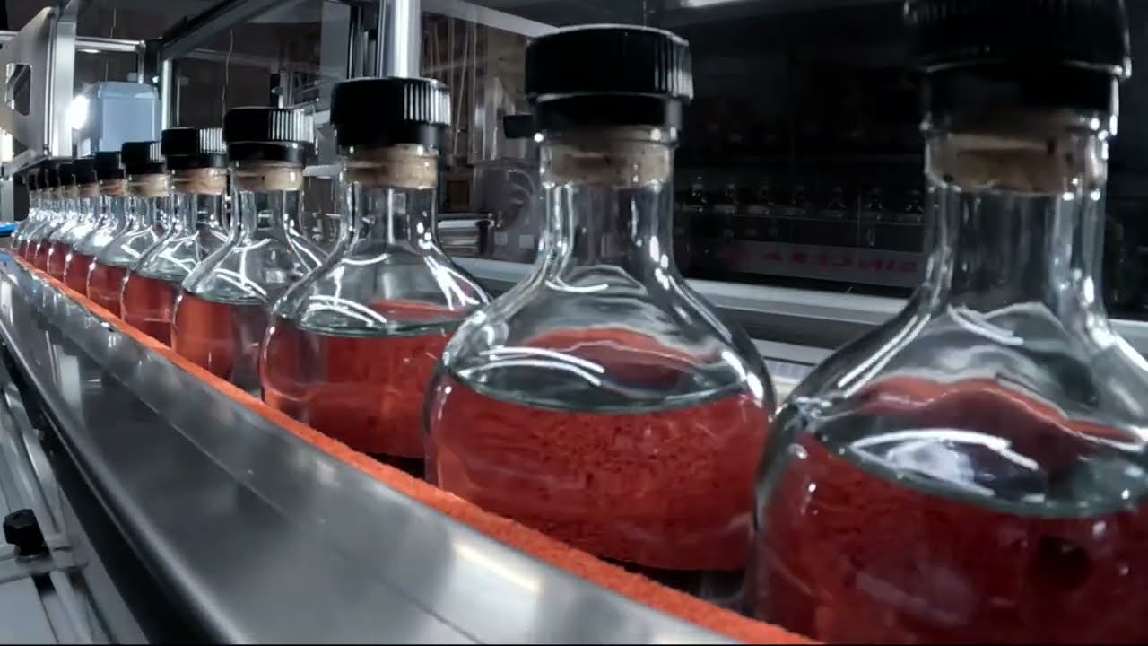Macchina ad alta produttività per la sigillatura con gommalacca o ceralacca delle bottiglie