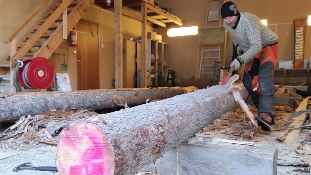 Hewing timber - making housetimber for restoration of an old timberhouse in Norway