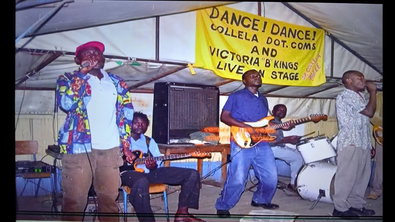 Wabed Gi Hera Chuth (Omoya )- Live performance by Collela Dot Coms at Ramogi Bar,Nairobi in 2004