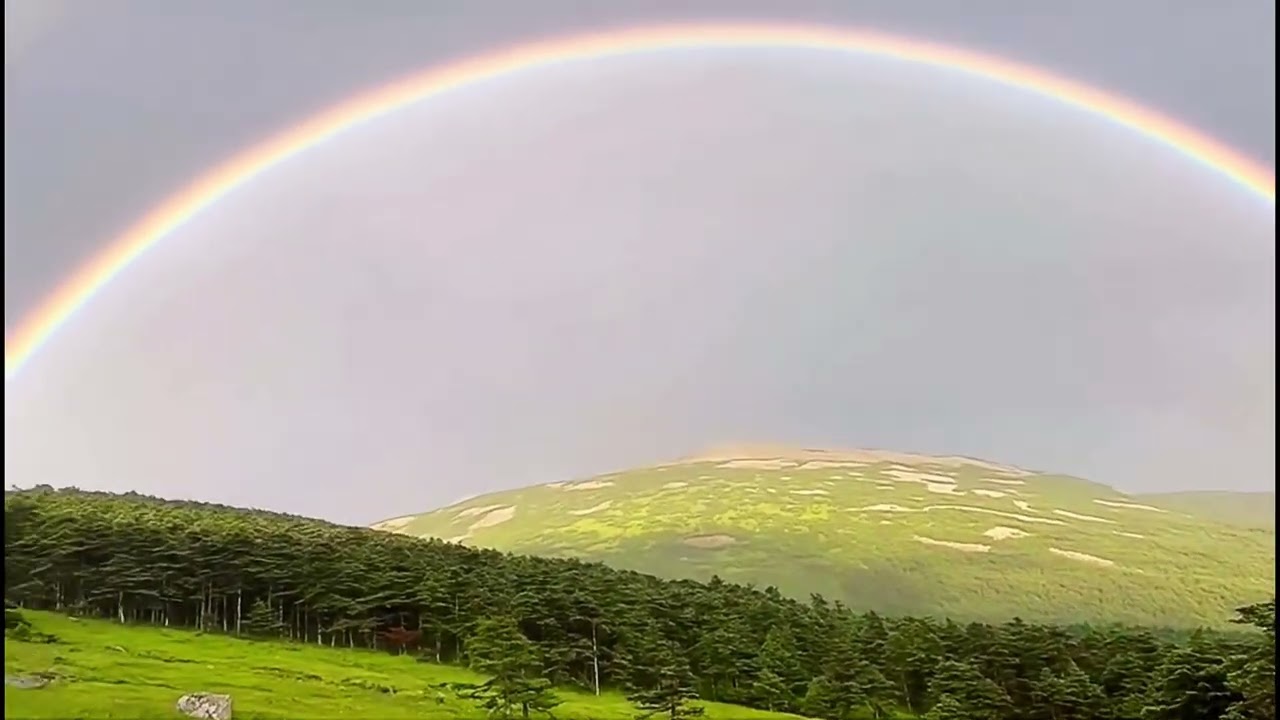 China's Qinling Mountains. Double rainbow. 