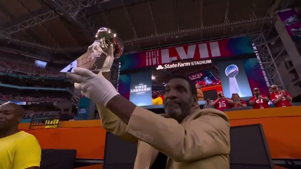 Doug Wiliams, Will Shields, Harold  Carmichael and the Vince Lombardi Trophy  | Super Bowl LVII