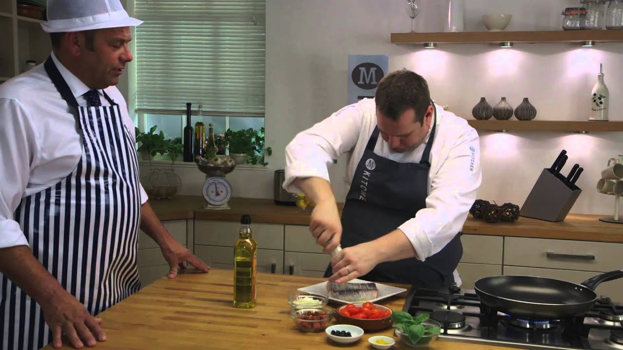 Pan-fried hake with Mediterranean tomatoes recipe | Morrisons