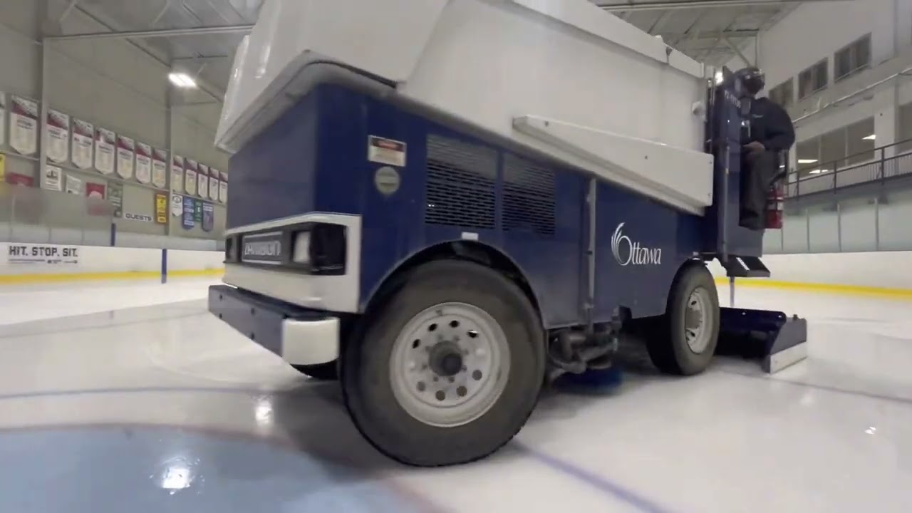 Zamboni Resurfacing the ice.