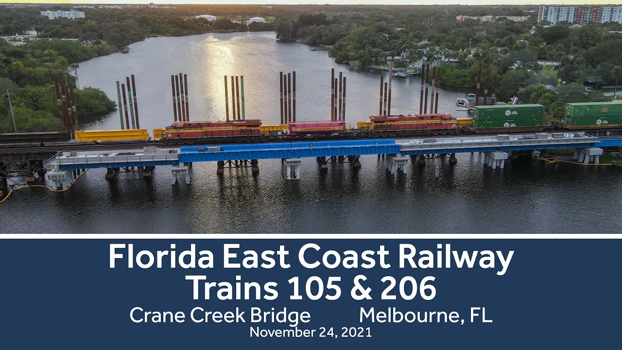 Florida East Coast Railway Trains 105 and 206 Crossing the Crane Creek Bridge - November 24, 2021