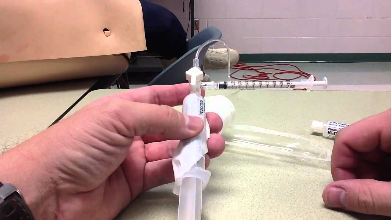 Using a stopcock to administer medications