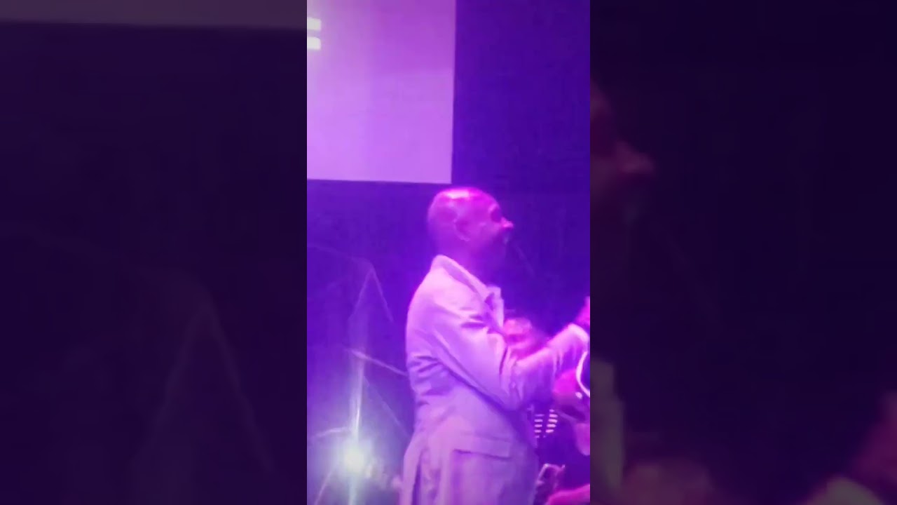 Emmitt Smith and Jerry Rice having fun at a Super Bowl party