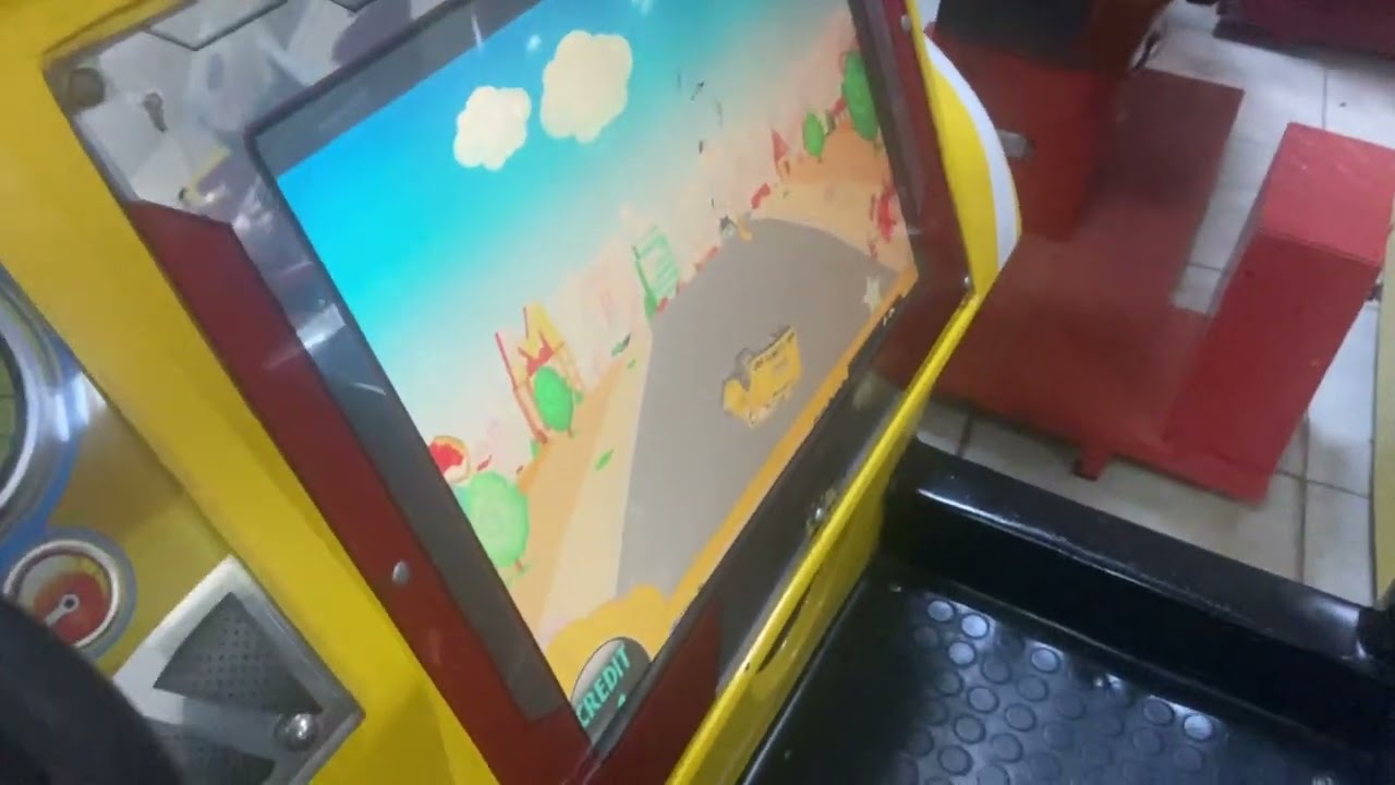 Feng Yung Cheng yellow Amazing Sports car kiddie ride. (Game Option.) (Now gone.)