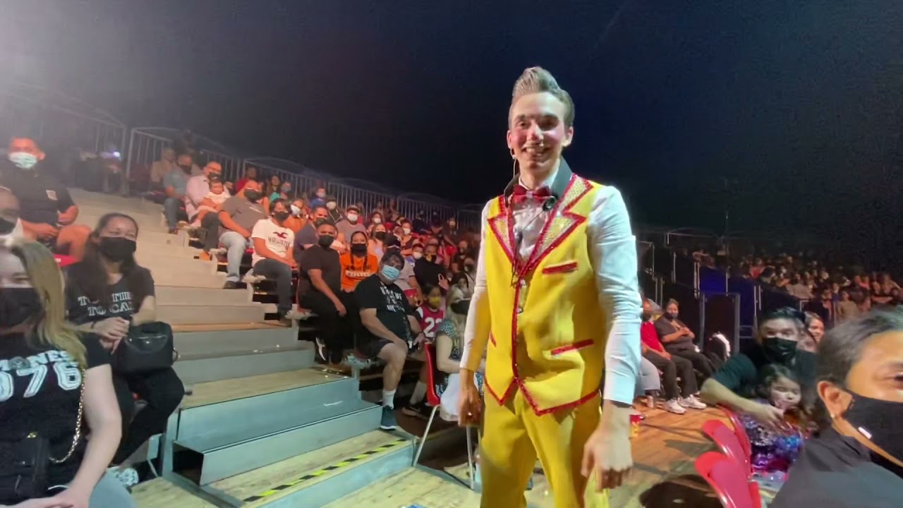 Clown playing saxophone in American Circus