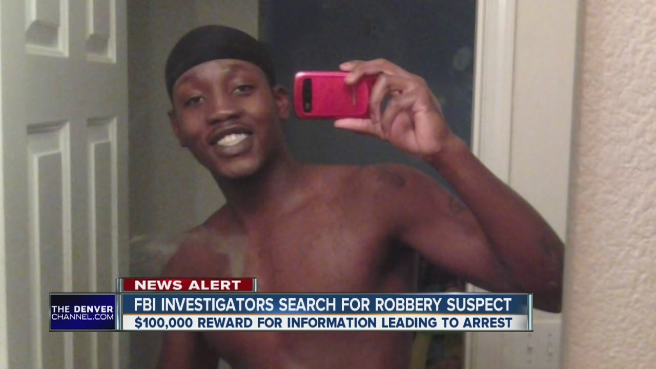 FBI investigators search for suspected 'Scream' mask robber