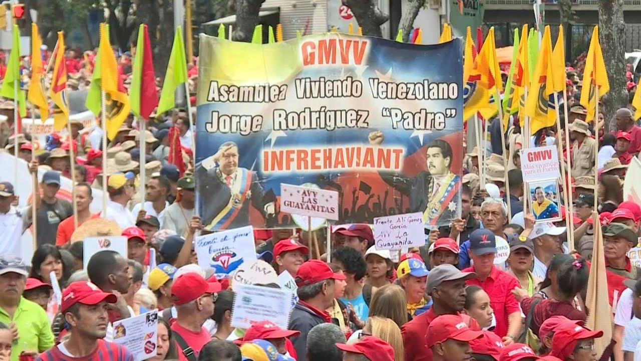 Venezualan government supporters rally to mark 'El Caracazo' | AFP