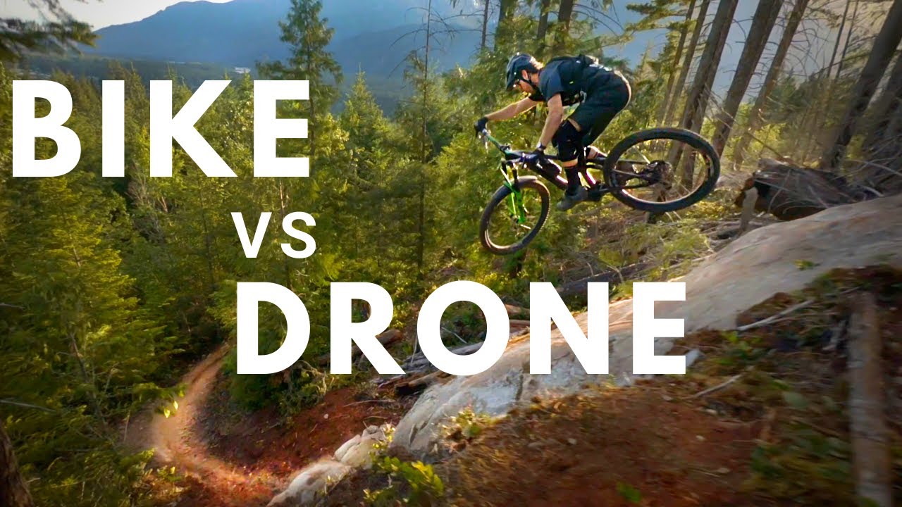 RACE DRONE Chases PRO MOUNTAIN BIKER down INSANE Trails