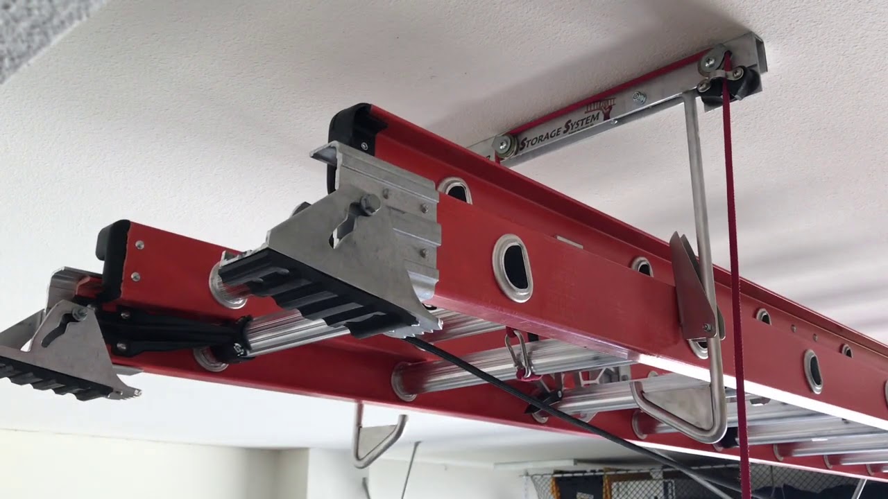Tall Ladder Storage System. (Pat.# 8,534,621)