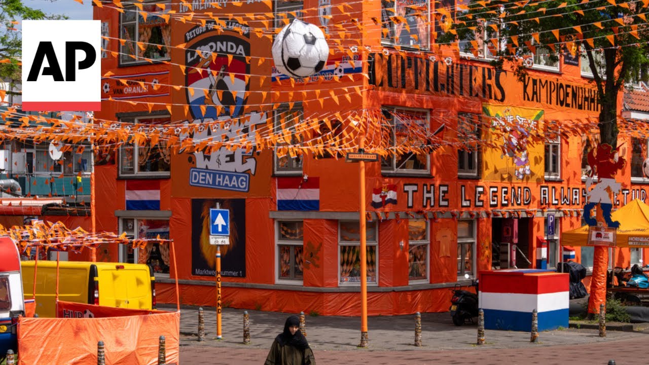 A street in The Hague gets an all-encompassing orange facelift for Euro 2024